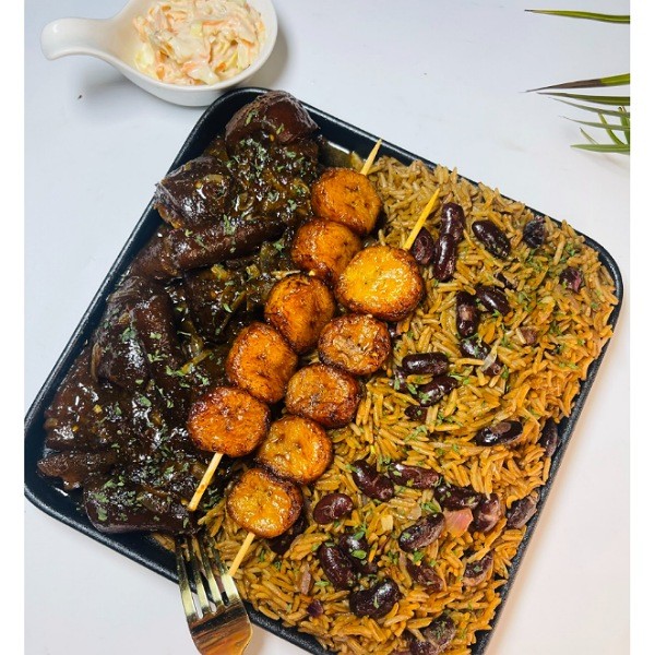 Jamaican Brown Rice with Oxtail Sauce.